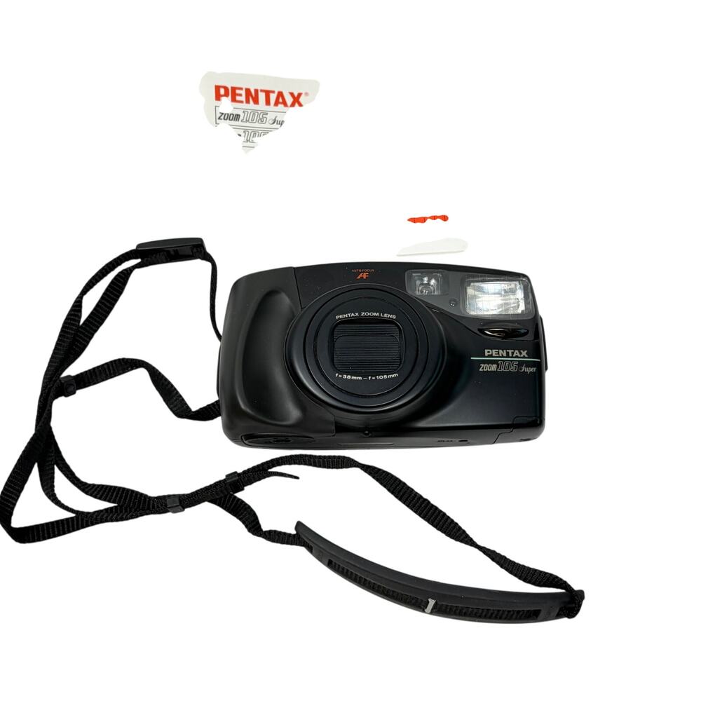 VTG Pentax zoom 105 super 35 mm camera with instructions, strap. Untested